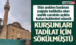 Tadilatta olan asırlık caminin açıkta kalan kubbeleri ıslandı