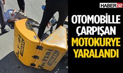 Otomobille çarpışan motokurye yaralandı