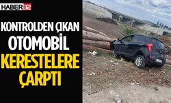 Kontrolden Çıkan Otomobil Kerestelere Çarptı