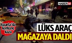 Isparta’da korkunç kaza: Lüks araç mağazaya daldı