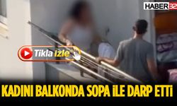 Kadını Balkonda Sopa İle Darp Etti
