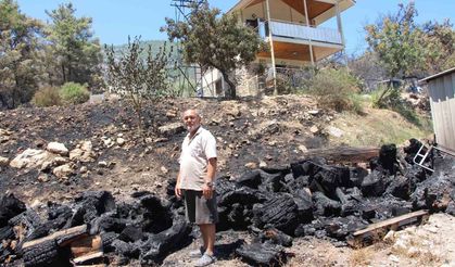 Emekli itfaiyeci, yılların tecrübesiyle evini alevlere teslim etmedi