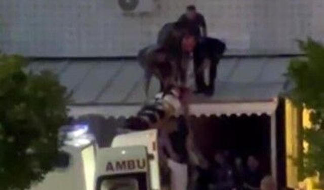 Cam silerken metrelerce yükseklikten düşen genç kız yaralandı