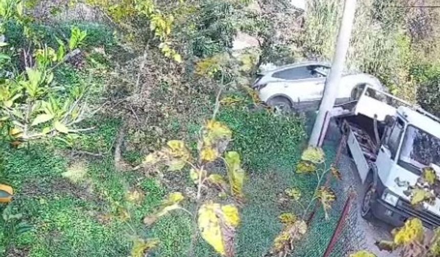 Çekiciye yüklenirken geri viteste unutulan araç rampadan uçtu: 2 yaralı