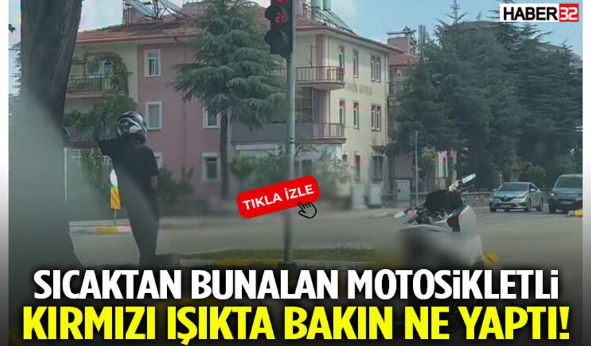 Sıcaktan Bunalan Motosikletli Kırmızı Işıkta Bakın Ne Yaptı!